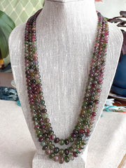 AAA-grade natural bi-color tourmaline smooth rondelle gemstone beads, graduated from 5.5mm to 11mm, featuring beautiful natural color variations for jewelry making. 3 strands on a bust