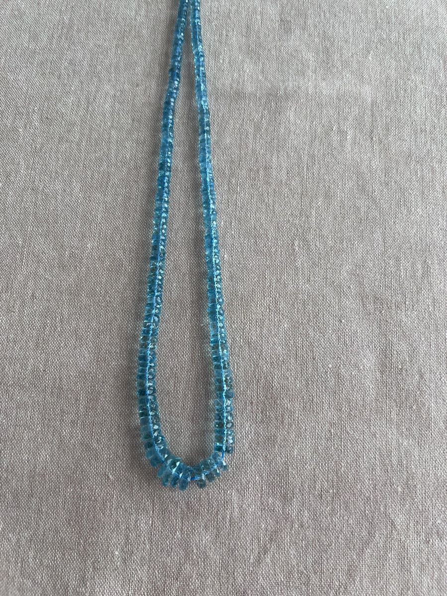 Strand of natural Santa Maria Aquamarine faceted tyre beads, graduated from 4mm to 9.5mm, for jewelry making. blue gemstone