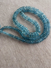 Strand of natural Santa Maria Aquamarine faceted tyre beads, graduated from 4mm to 9.5mm, for jewelry making.