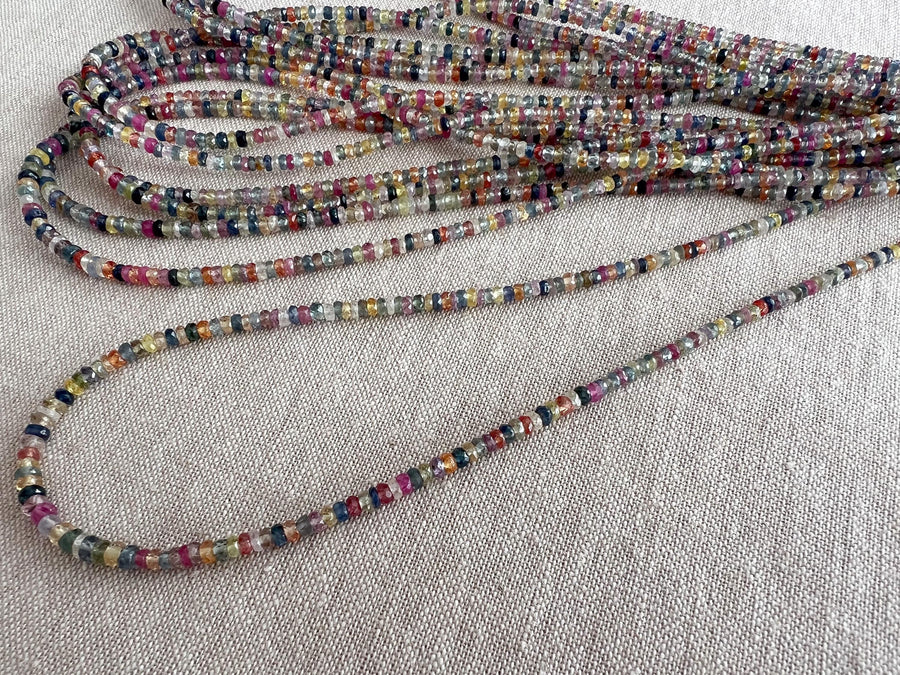 16-inch strand of natural unheated Sapphire faceted rondelle beads in assorted colors, graduated from 2.5mm to 4mm. multiple strands