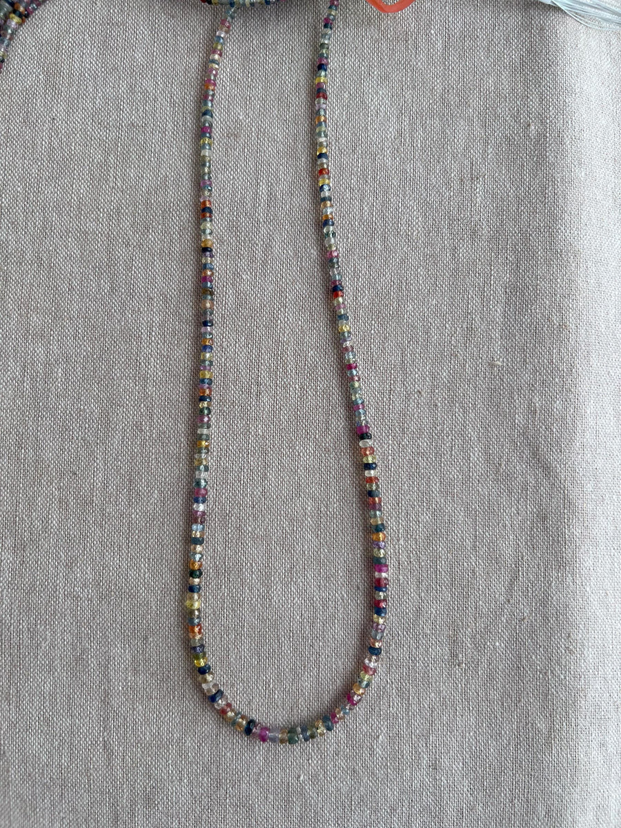 16-inch strand of natural unheated Sapphire faceted rondelle beads in assorted colors, graduated from 2.5mm to 4mm.