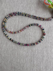 16-inch strand of natural unheated Sapphire faceted rondelle beads in assorted colors, graduated from 2.5mm to 4mm.