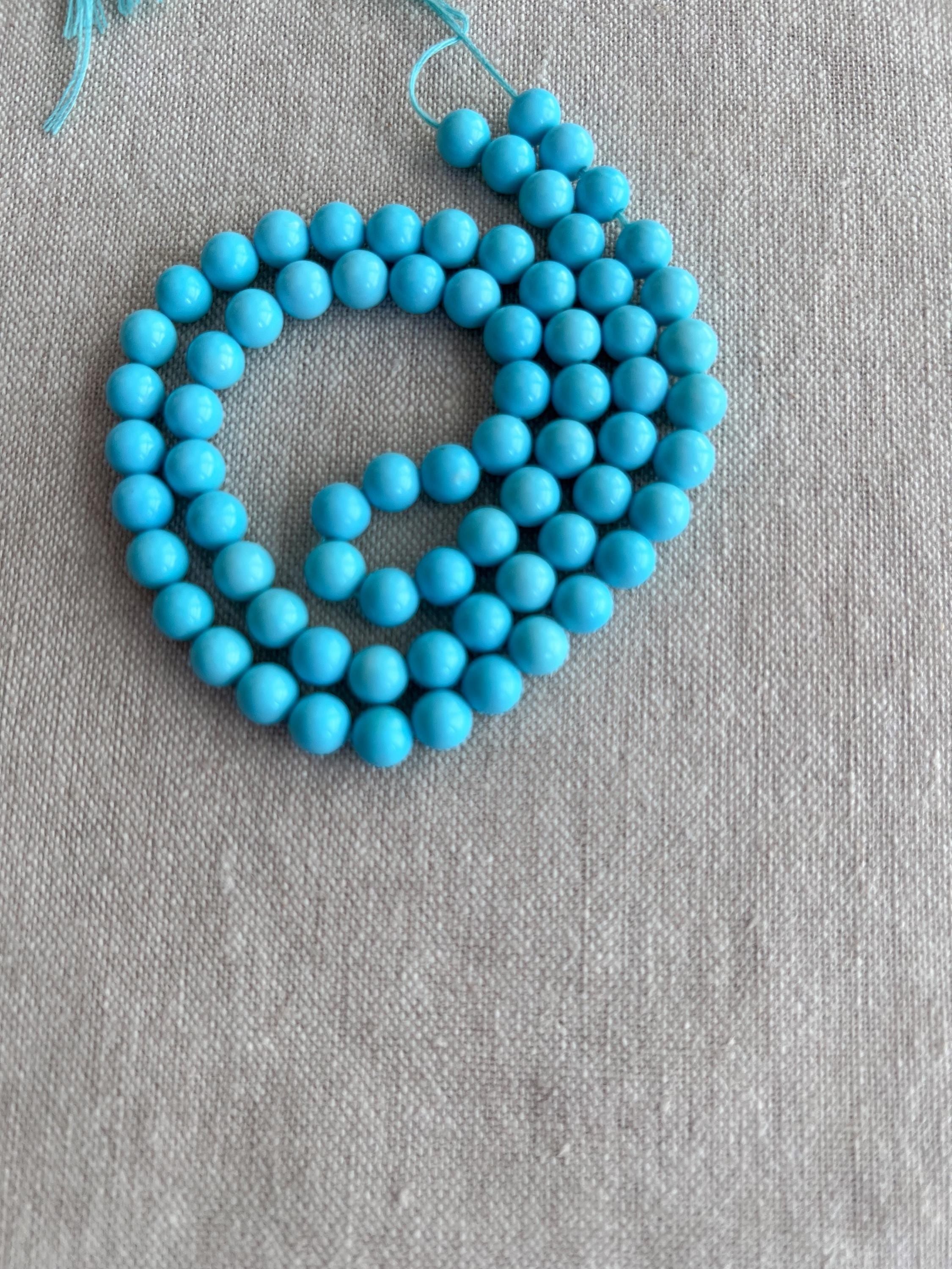 AAA+ Sleeping Beauty Turquoise smooth round beads, natural Arizona turquoise, 6mm, 16-inch gemstone strand.