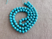 AAA+ Sleeping Beauty Turquoise smooth round beads, natural Arizona turquoise, 6mm, 16-inch gemstone strand.