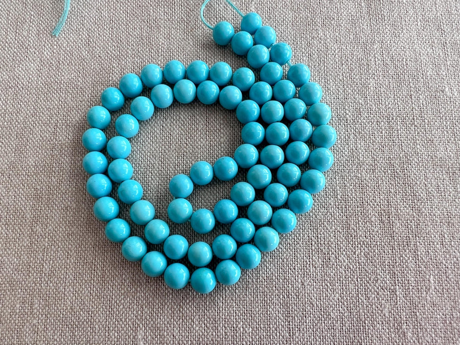 AAA+ Sleeping Beauty Turquoise smooth round beads, natural Arizona turquoise, 6mm, 16-inch gemstone strand.