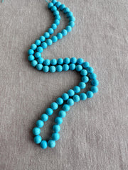 16-inch strand of AAA+ Sleeping Beauty Turquoise smooth round gemstone beads for fine jewelry making.