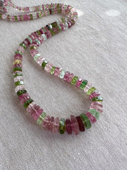 AAA natural Tourmaline bolt cut gemstone beads featuring soft pink, medium pink, and light to dark green tones.