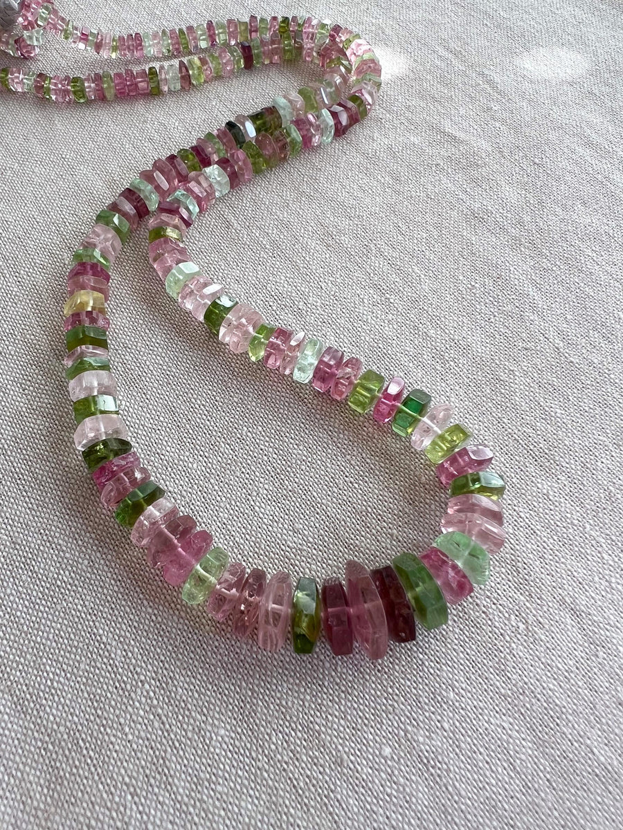 AAA natural Tourmaline bolt cut gemstone beads featuring soft pink, medium pink, and light to dark green tones.