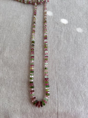 Strand of natural untreated Tourmaline faceted bolt beads in graduated sizes, ideal for fine jewelry making.