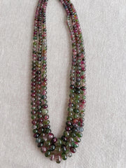 AAA-grade natural bi-color tourmaline smooth rondelle gemstone beads, graduated from 5.5mm to 11mm, featuring beautiful natural color variations for jewelry making. triple strand 