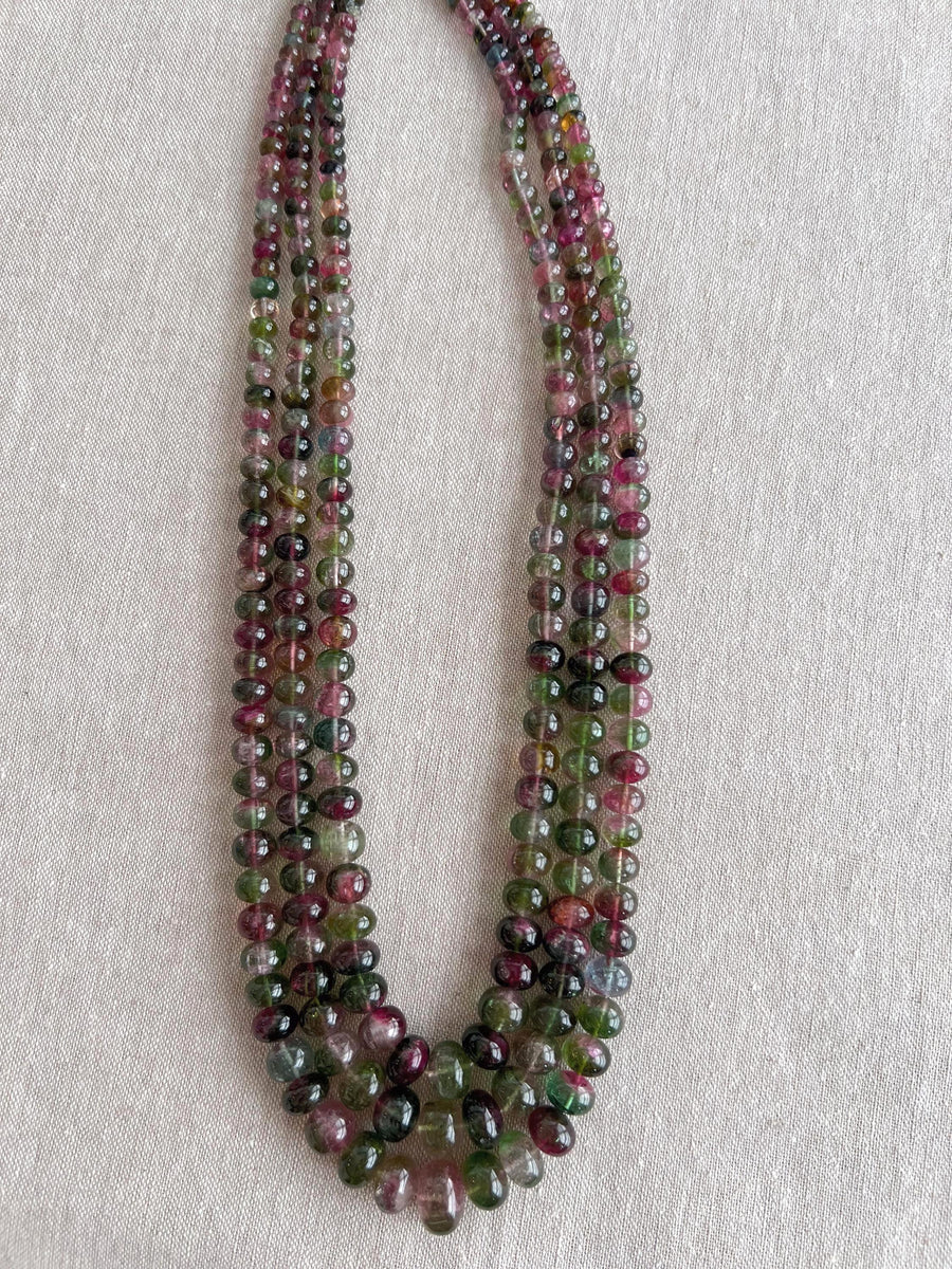 AAA-grade natural bi-color tourmaline smooth rondelle gemstone beads, graduated from 5.5mm to 11mm, featuring beautiful natural color variations for jewelry making. triple strand 