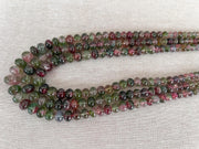 AAA-grade natural bi-color tourmaline smooth rondelle gemstone beads, graduated from 5.5mm to 11mm, featuring beautiful natural color variations for jewelry making. triple strand