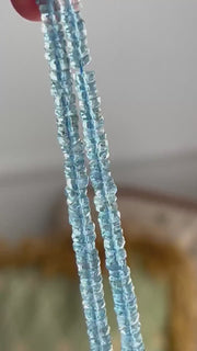 Strand of natural Santa Maria Aquamarine faceted tyre beads, graduated from 4mm to 9.5mm, for jewelry making. video in natural sunlight